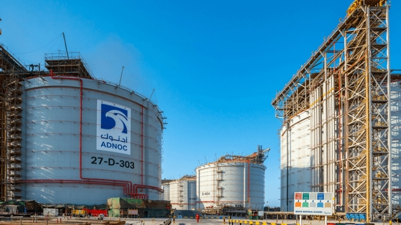 ADNOC oil storage tanks and infrastructure at an upstream production site