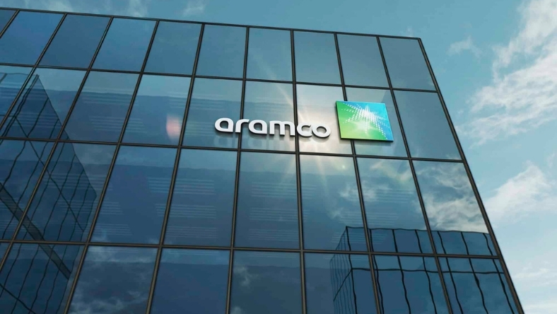 Aramco logo displayed on glass office building